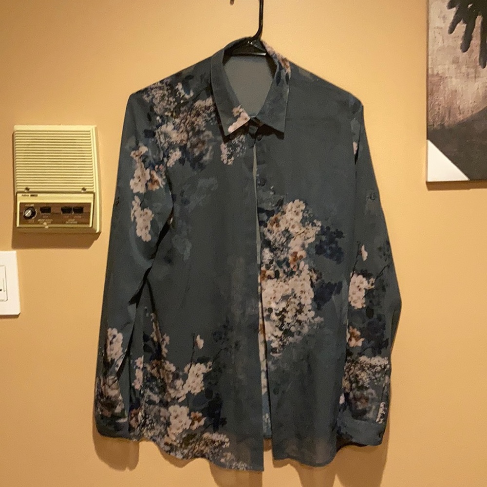 A see through button up blouse